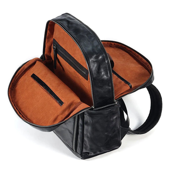 Vegetable-tanned leather commuter bag in black for men
