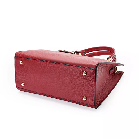 Elegant women's handbag with top handle by designer