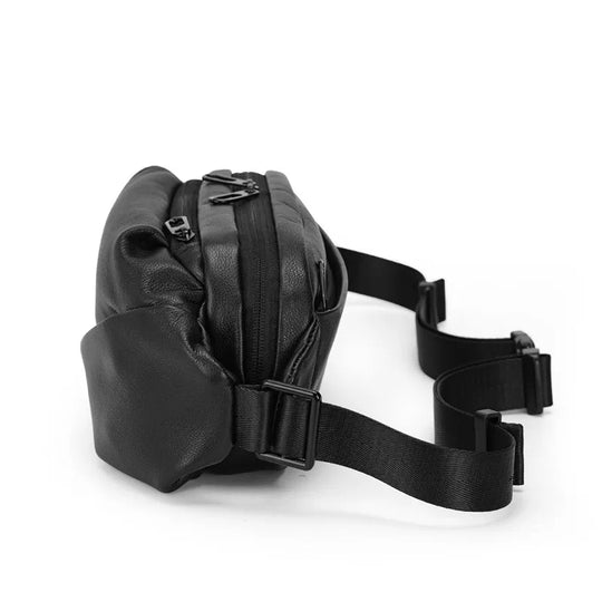 Sleek and versatile black leather sling backpack
