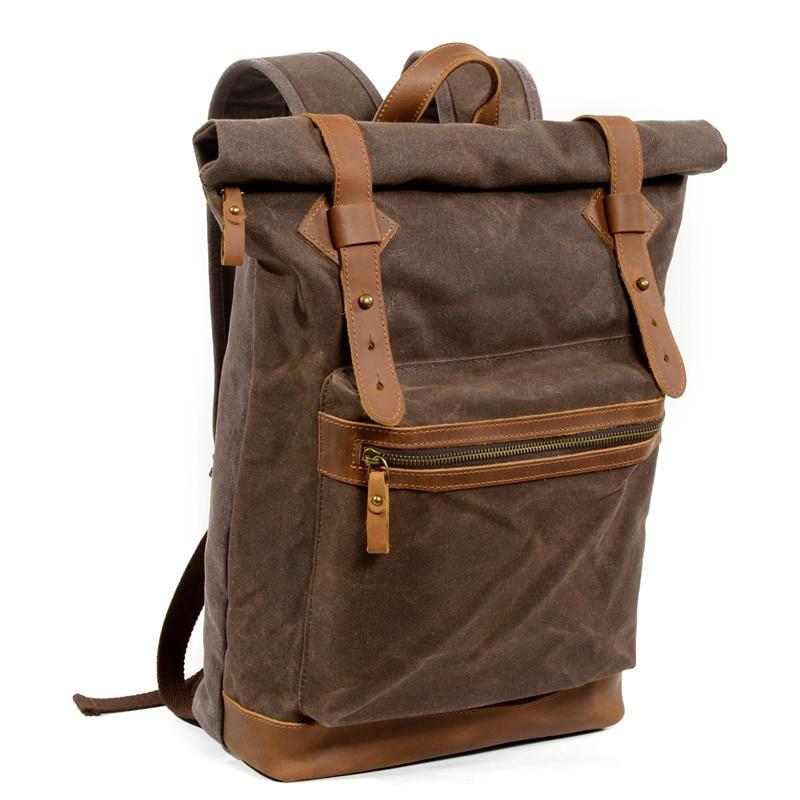 Students' waterproof luxury canvas leather backpack in 20-liter size
