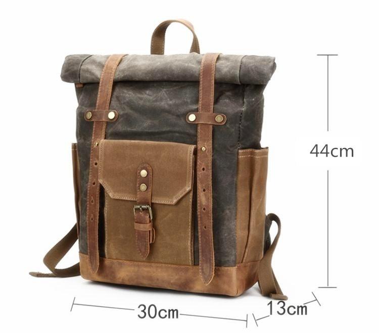 Canvas leather travel backpack with 14-inch laptop compartment and waterproofing