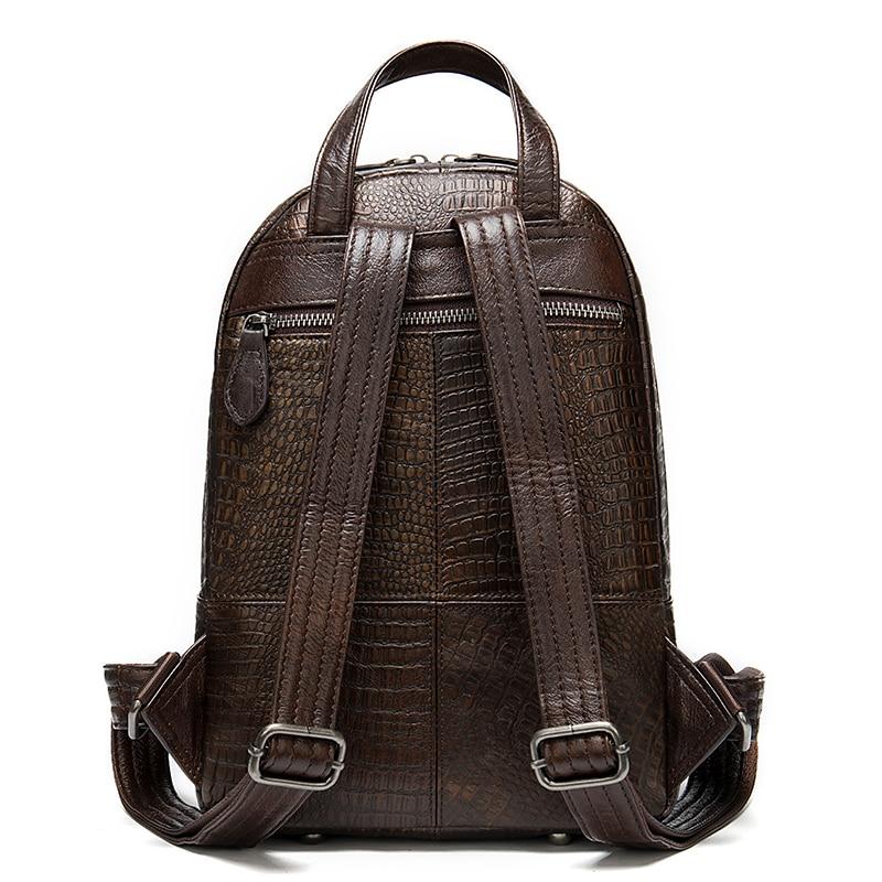 Leather backpack with embossed details and colorful patchwork pattern