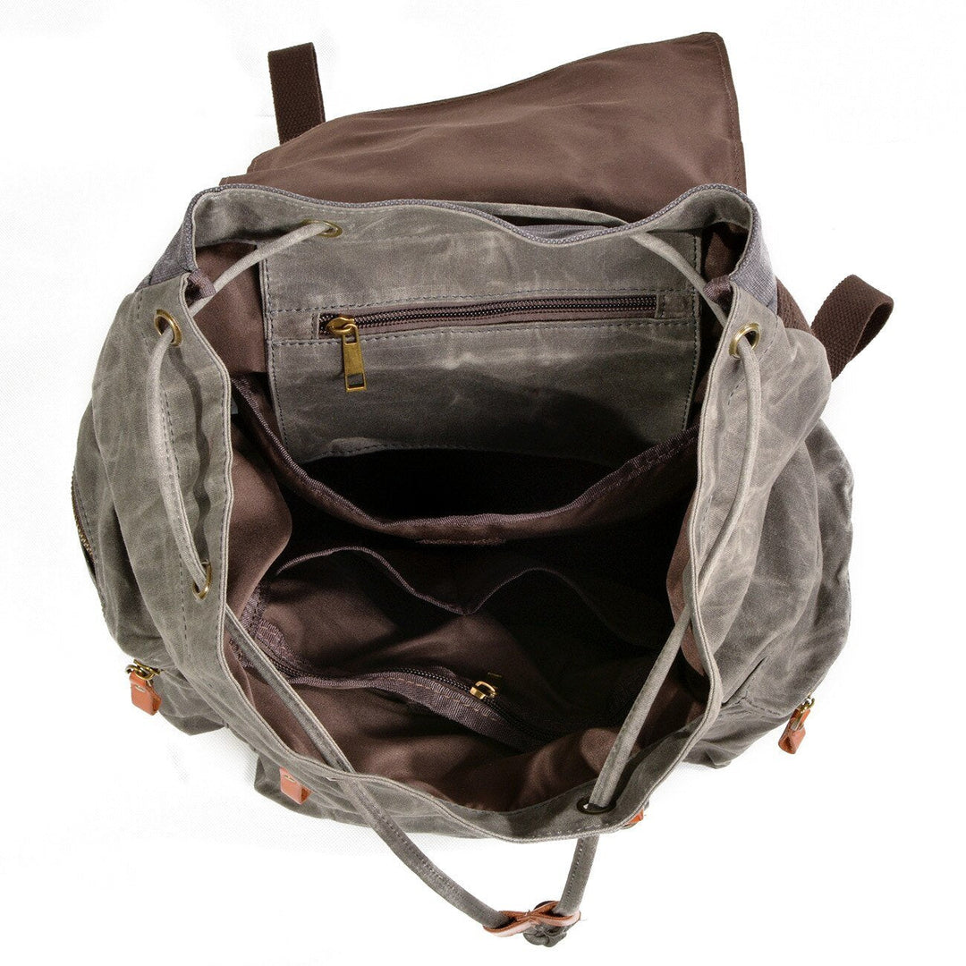 Canvas leather hiking backpack in black and brown with waterproofing