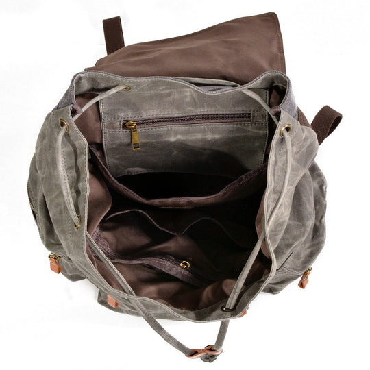 Canvas leather hiking backpack in black and brown with waterproofing