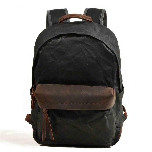 Canvas leather backpack in green and brown 20 to 35 liters