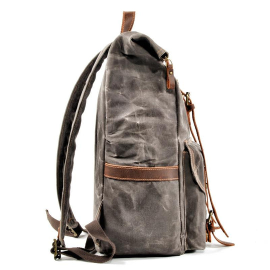 Retro style genuine leather and canvas travel backpack with 2 color variations