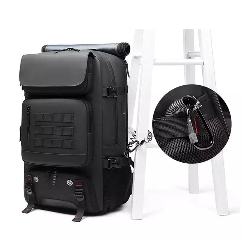 Black backpack with expandable design and charging capability