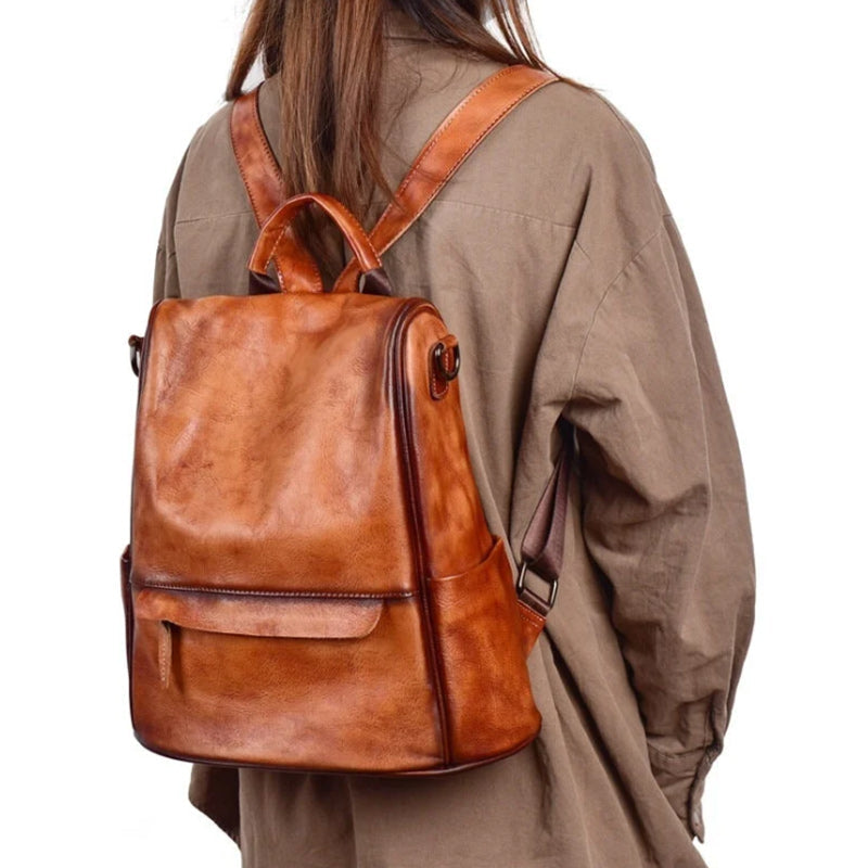 Versatile fashion leather backpack with zipper closure