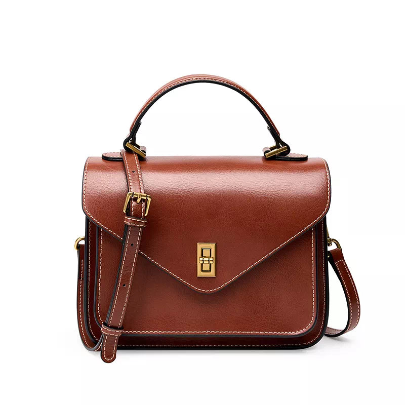Small leather satchel with top handle