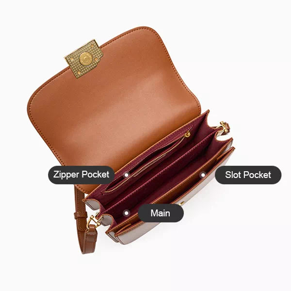 Exclusive leather crossbody bag with designer details