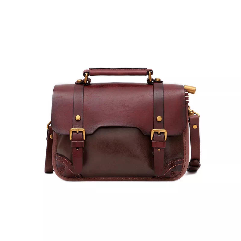 Compact satchel bag with exclusive detailing